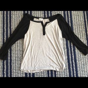 Soft, quarter sleeve baseball style shirt.